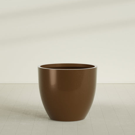 Wannsee Round Planter in Metallic Bronze, 50"D × 44"H, shown empty