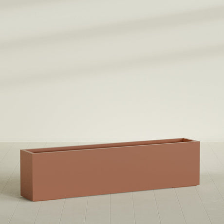 Miami Narrow Rectangular Planter in Matte Terra Cotta, 72"L × 12"D × 18"H, shown empty