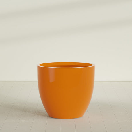 Wannsee Round Planter in Gloss Tangerine, 50"D × 44"H, shown empty