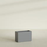 Tolga Rectangular Planter in Matte Gunmetal, 36"L × 16"D × 24"H, shown empty
