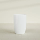 Lisbon tall round tapered fiberglass planter in Matte Bright White, 24 in diameter, 36 in high, shown empty