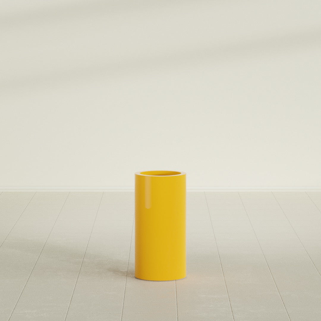 Corry Cylinder Planter in Gloss Saffron, 10"D × 20"H, shown empty
