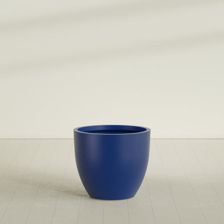 Wannsee Round Planter in Matte Cobalt Blue, 39"D × 34"H, shown empty