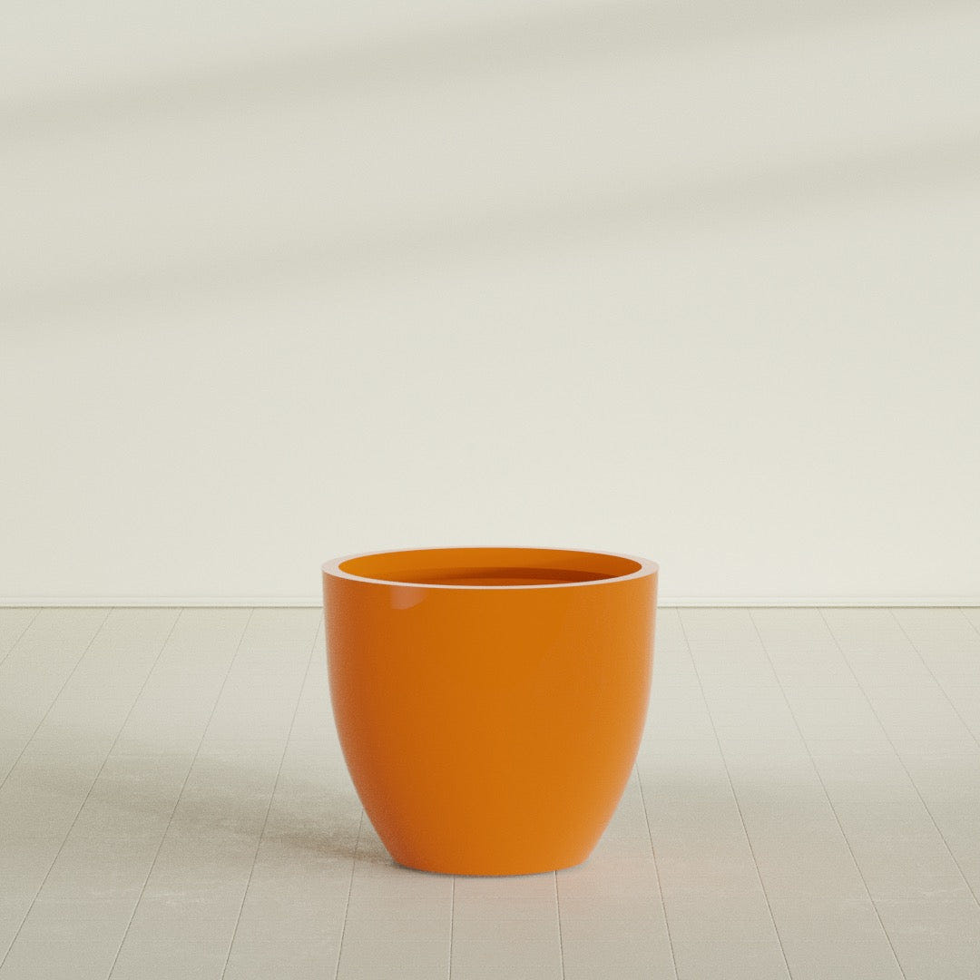 Wannsee Round Planter in Gloss Tangerine, 39"D × 34"H, shown empty