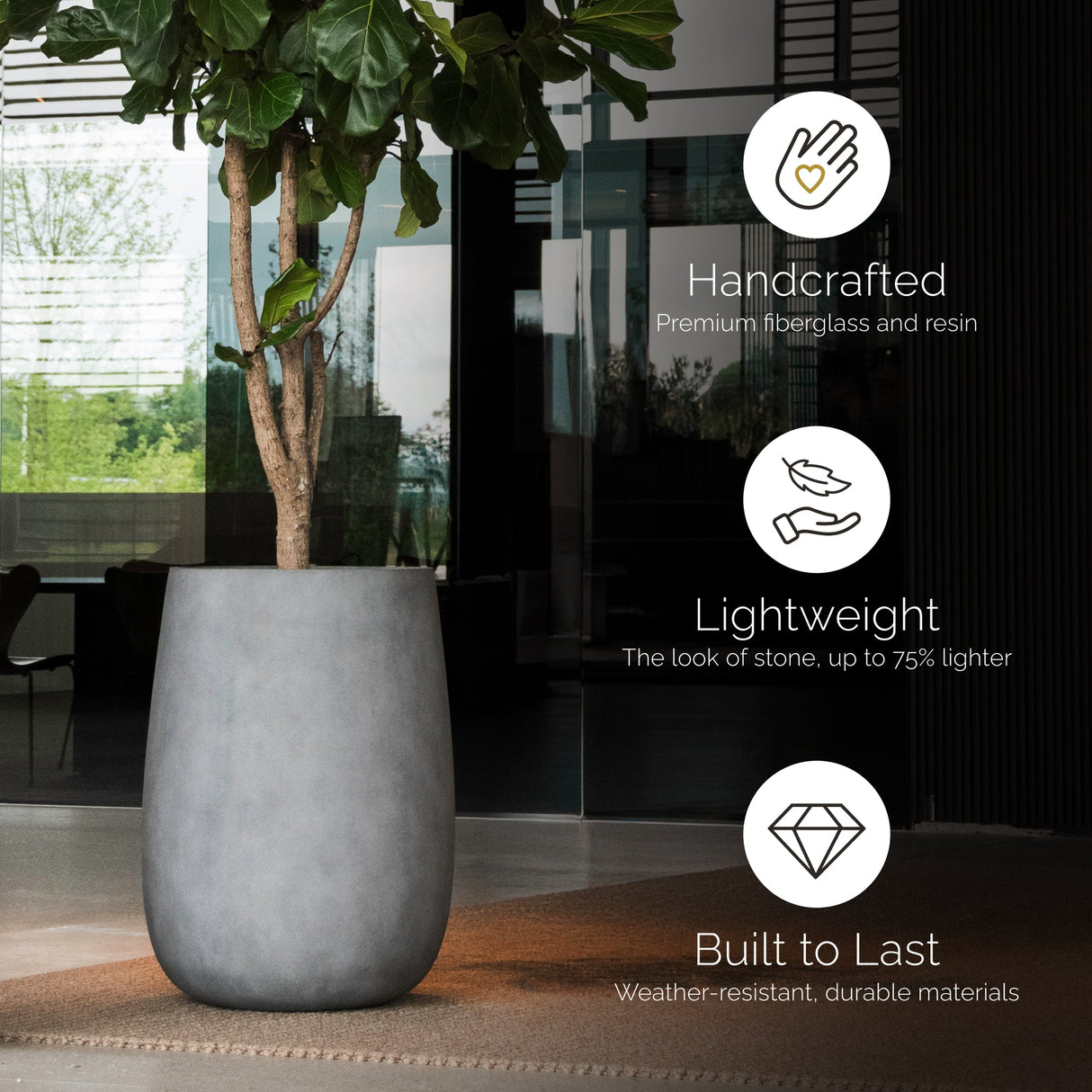 Mondo High tall round Cosapots fiberglass planter, shown planted in a styled setting.
