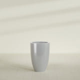 Brannan Tapered Round Planter in Metallic Silver, 24"D × 35"H, shown empty