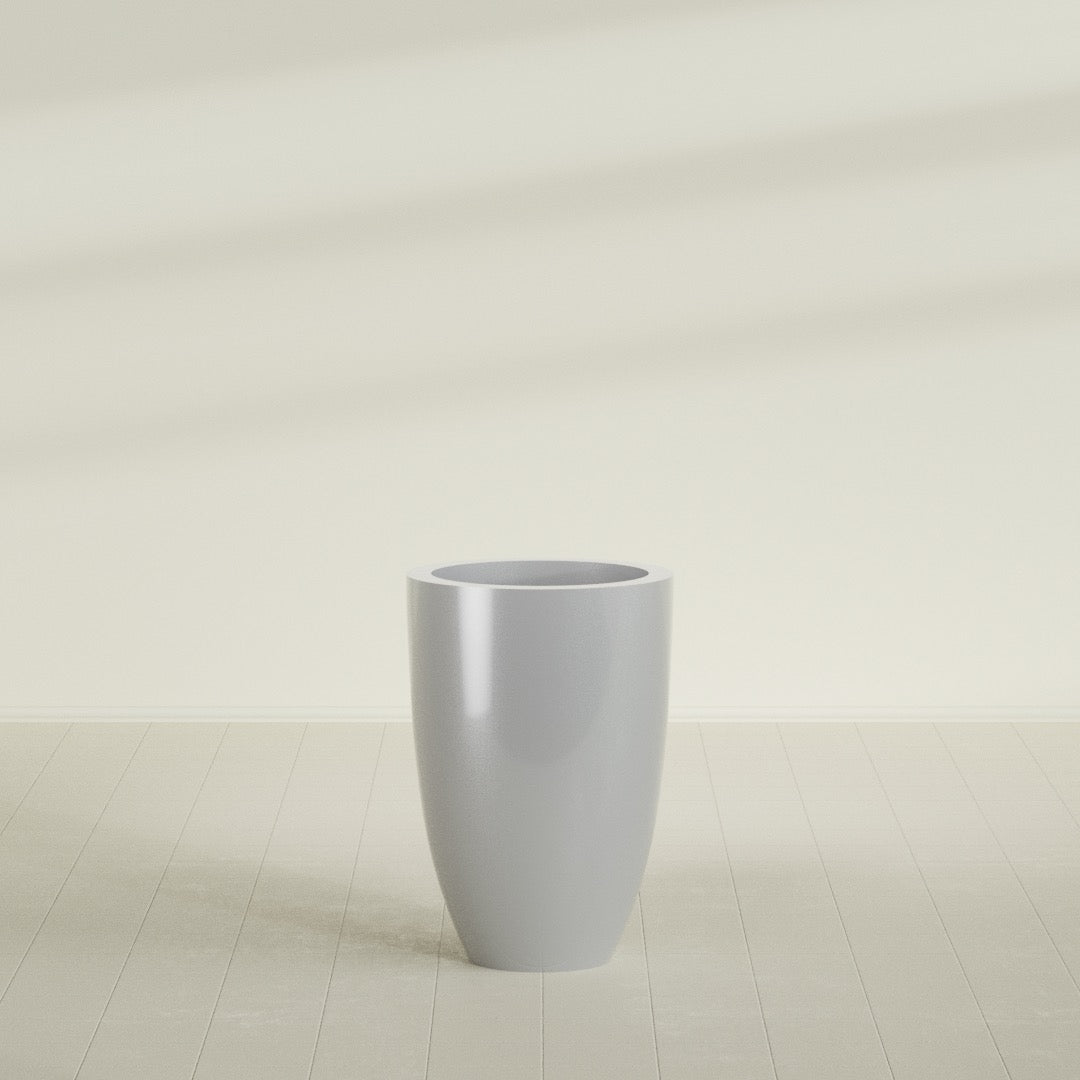 Brannan Tapered Round Planter in Metallic Silver, 24"D × 35"H, shown empty