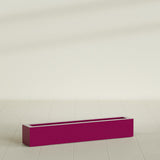 Salon Box Planter in Gloss Eggplant, 48" Long, shown empty