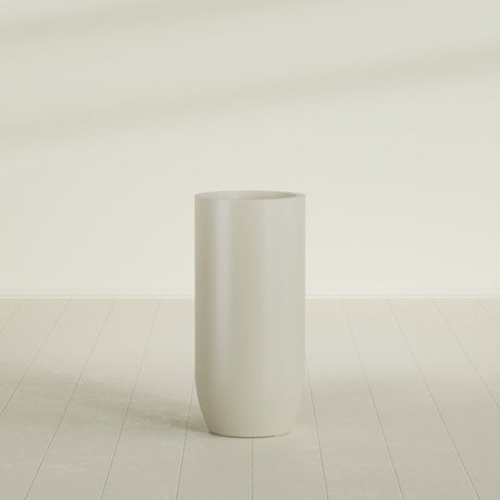 Saint Tropez Bullet Round Planter in Satin Beige, 20"D × 43"H, shown empty
