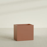 Brisbane Rectangular Planter in Matte Terra Cotta, 36"L × 24"D × 32"H, shown empty