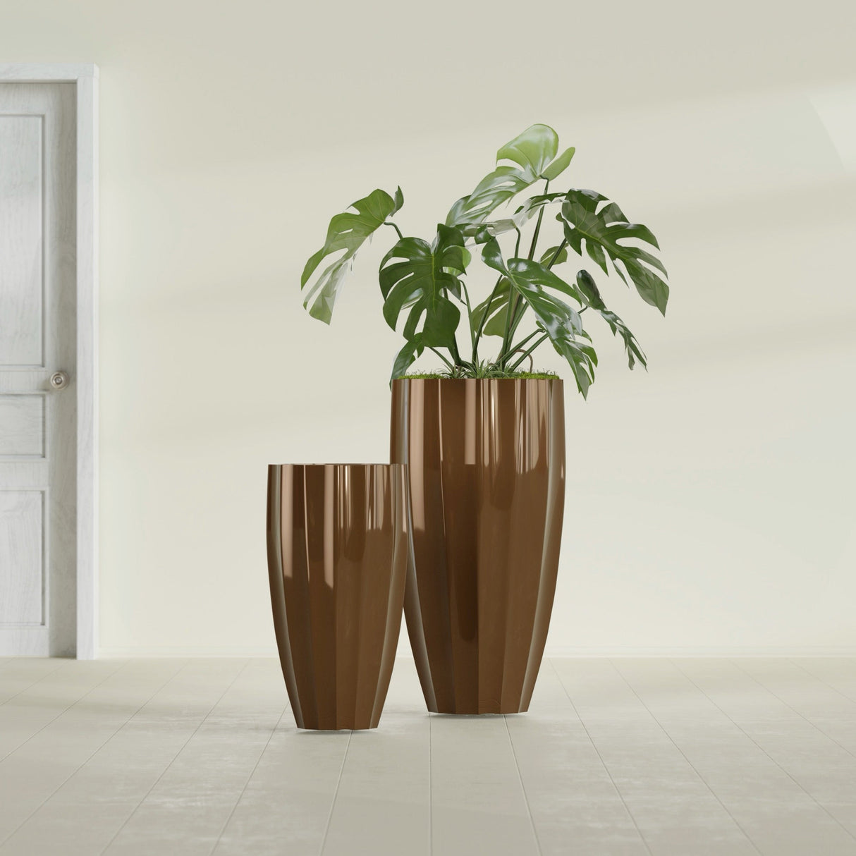 San Jose Tall Fluted fiberglass planter in Metallic Bronze, size range, in a sunlit interior