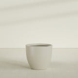 Wannsee Round Planter in Satin Beige, 39"D × 34"H, shown empty