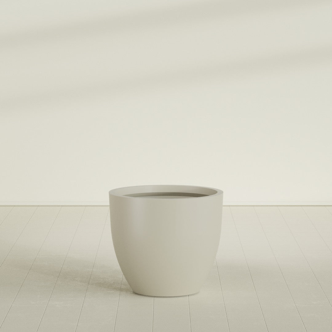 Wannsee Round Planter in Satin Beige, 39"D × 34"H, shown empty