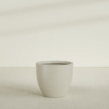 Wannsee Round Planter in Satin Beige, 39"D × 34"H, shown empty