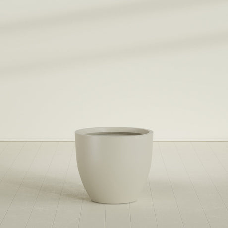 Wannsee Round Planter in Satin Beige, 39"D × 34"H, shown empty