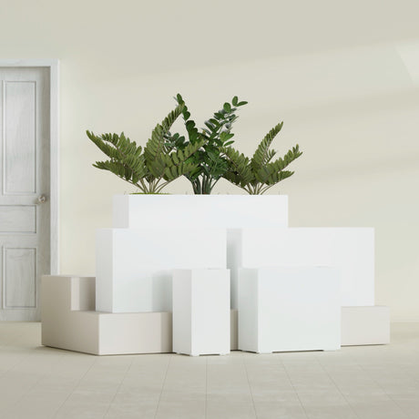 Potsdam Corner fiberglass planter in Gloss Bright White, size range, in a sunlit interior