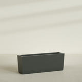 Panama Tapered Rectangular Planter in Matte Charcoal, 48"L × 12"D × 18"H, shown empty