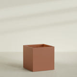 Montroy Cube Planter in Matte Terra Cotta, 48", shown empty