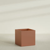Montroy Cube Planter in Matte Terra Cotta, 48", shown empty
