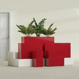 Potsdam Corner fiberglass planter in Gloss Red, size range, in a sunlit interior