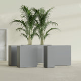 Perth Corner fiberglass planter in Matte Gunmetal, size range, in a sunlit interior