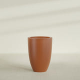 Brannan Tapered Round Planter in Matte Terra Cotta, 30"D × 41"H, shown empty