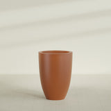 Brannan Tapered Round Planter in Matte Terra Cotta, 30"D × 41"H, shown empty
