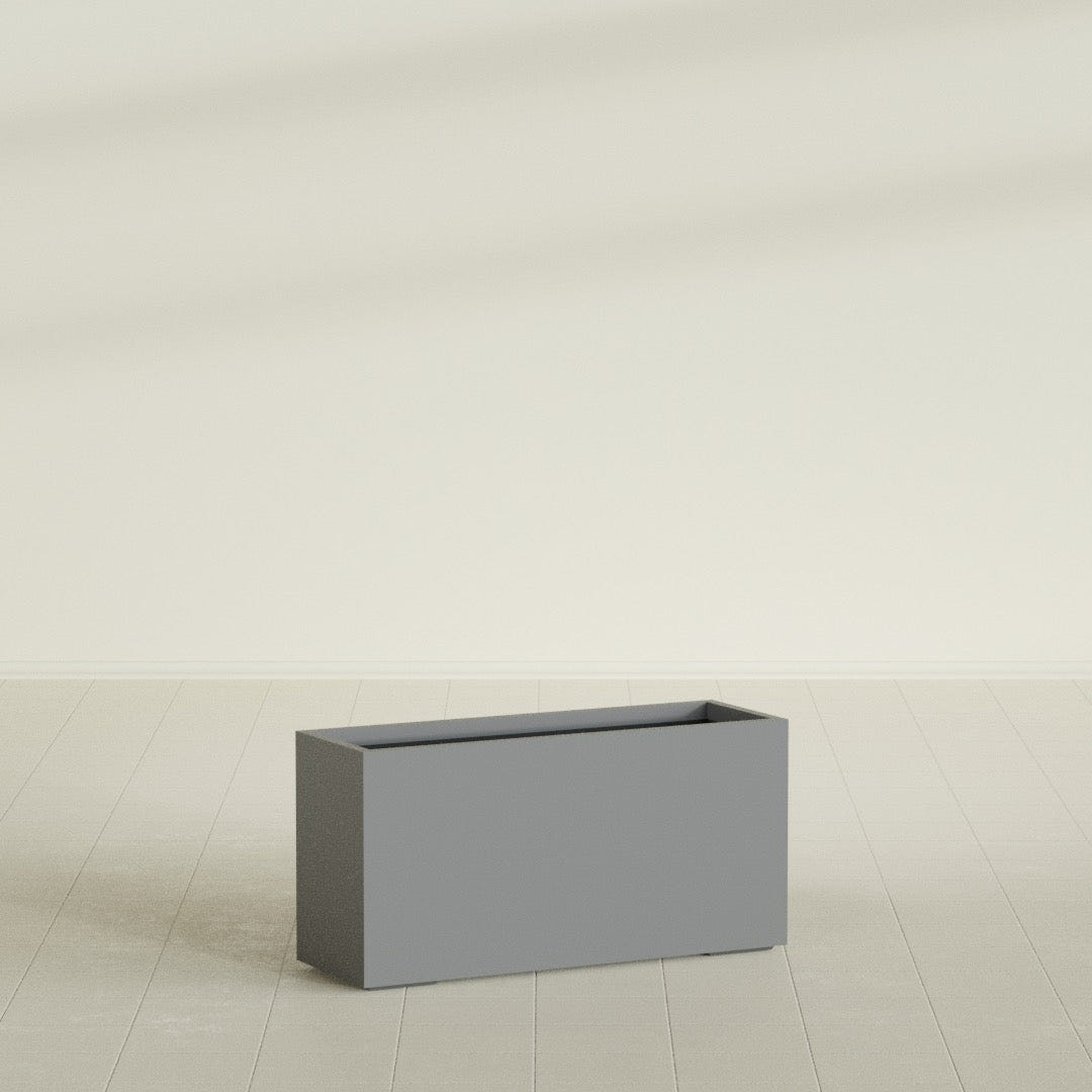Tolga Rectangular Planter in Matte Gunmetal, 48"L × 16"D × 24"H, shown empty