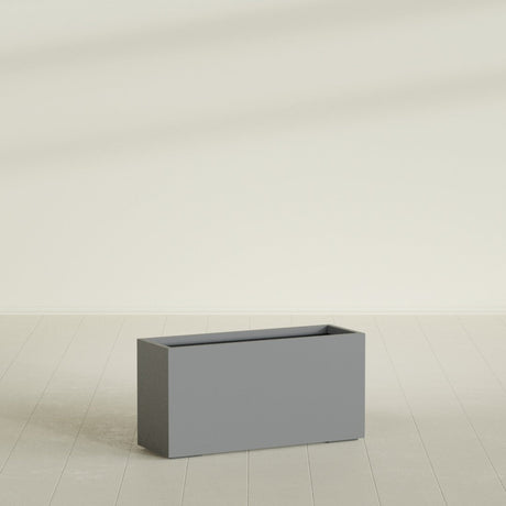Tolga Rectangular Planter in Matte Gunmetal, 48"L × 16"D × 24"H, shown empty