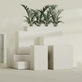 Darwin Rectangular fiberglass planter in Satin Beige, size range, in a sunlit interior