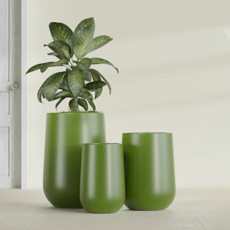 Hayden Urn fiberglass planter in Satin Green, size range, in a sunlit interior
