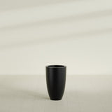 Brannan Tapered Round Planter in Matte Black, 18"D × 29"H, shown empty