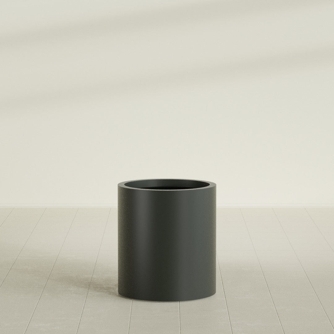 Rio Grande Cylinder Planter in Matte Charcoal, 18"D × 20"H, shown empty