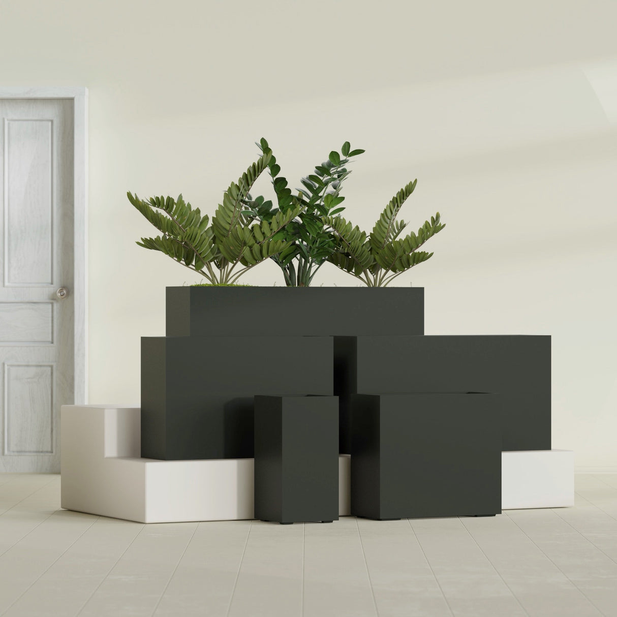 Potsdam Corner fiberglass planter in Matte Charcoal, size range, in a sunlit interior