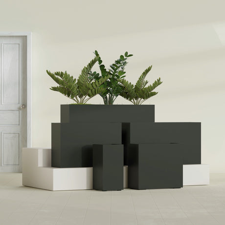 Potsdam Corner fiberglass planter in Matte Charcoal, size range, in a sunlit interior