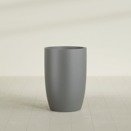 Lisbon tall round tapered fiberglass planter in Matte Gunmetal, 24 in diameter, 36 in high, shown empty