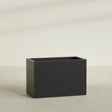 Brisbane Rectangular Planter in Matte Black, 48"L × 24"D × 32"H, shown empty