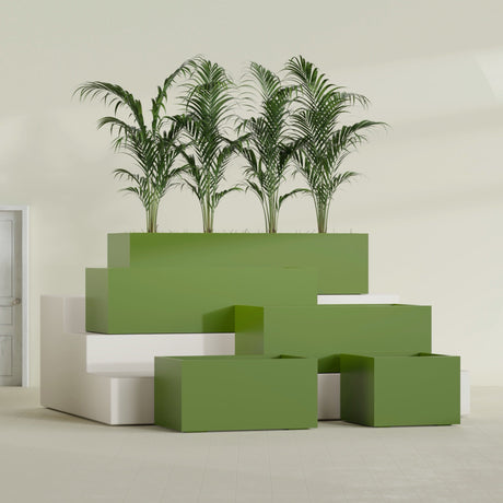 Torino Corner fiberglass planter in Satin Green, size range, in a sunlit interior