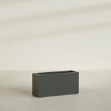 Hollywood Narrow Rectangular Planter in Matte Charcoal, 36"L × 12"D × 24"H, shown empty