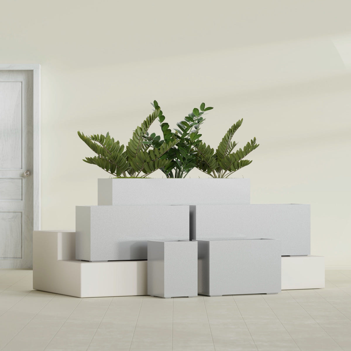 Tolga Rectangular fiberglass planter in Metallic Silver, size range, in a sunlit interior