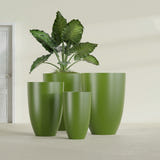 Brannan Tapered Round fiberglass planter in Satin Green, size range, in a sunlit interior