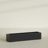 Cuba Low Rectangular Planter in Matte Black, 60"L × 14"D × 12"H, shown empty