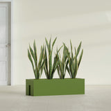 Tiergarden Railing fiberglass planter in Satin Green, shown planted, in a sunlit interior