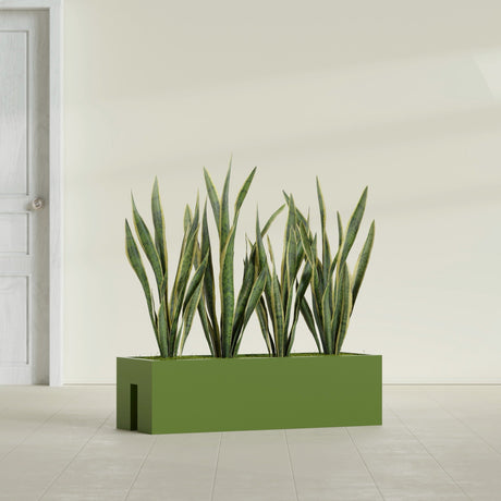 Tiergarden Railing fiberglass planter in Satin Green, shown planted, in a sunlit interior