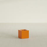 Montroy Cube Planter in Gloss Tangerine, 12", shown empty