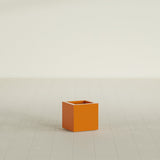 Montroy Cube Planter in Gloss Tangerine, 12", shown empty