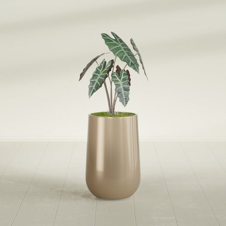 Hayden Urn fiberglass planter in Gloss Metallic Gold, shown planted, in a sunlit interior