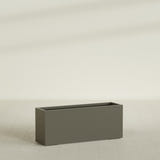 Tolga Rectangular Planter in Matte Bronze, 60"L × 16"D × 24"H, shown empty