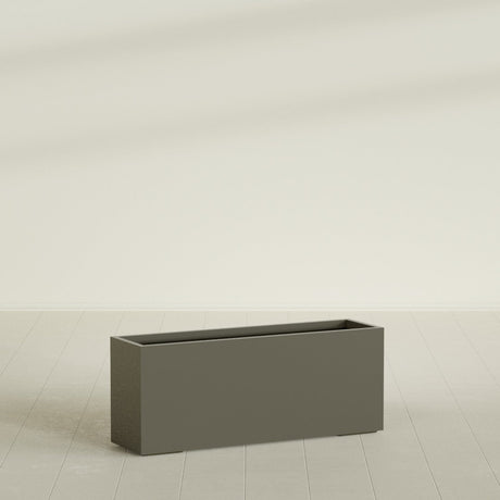 Tolga Rectangular Planter in Matte Bronze, 60"L × 16"D × 24"H, shown empty