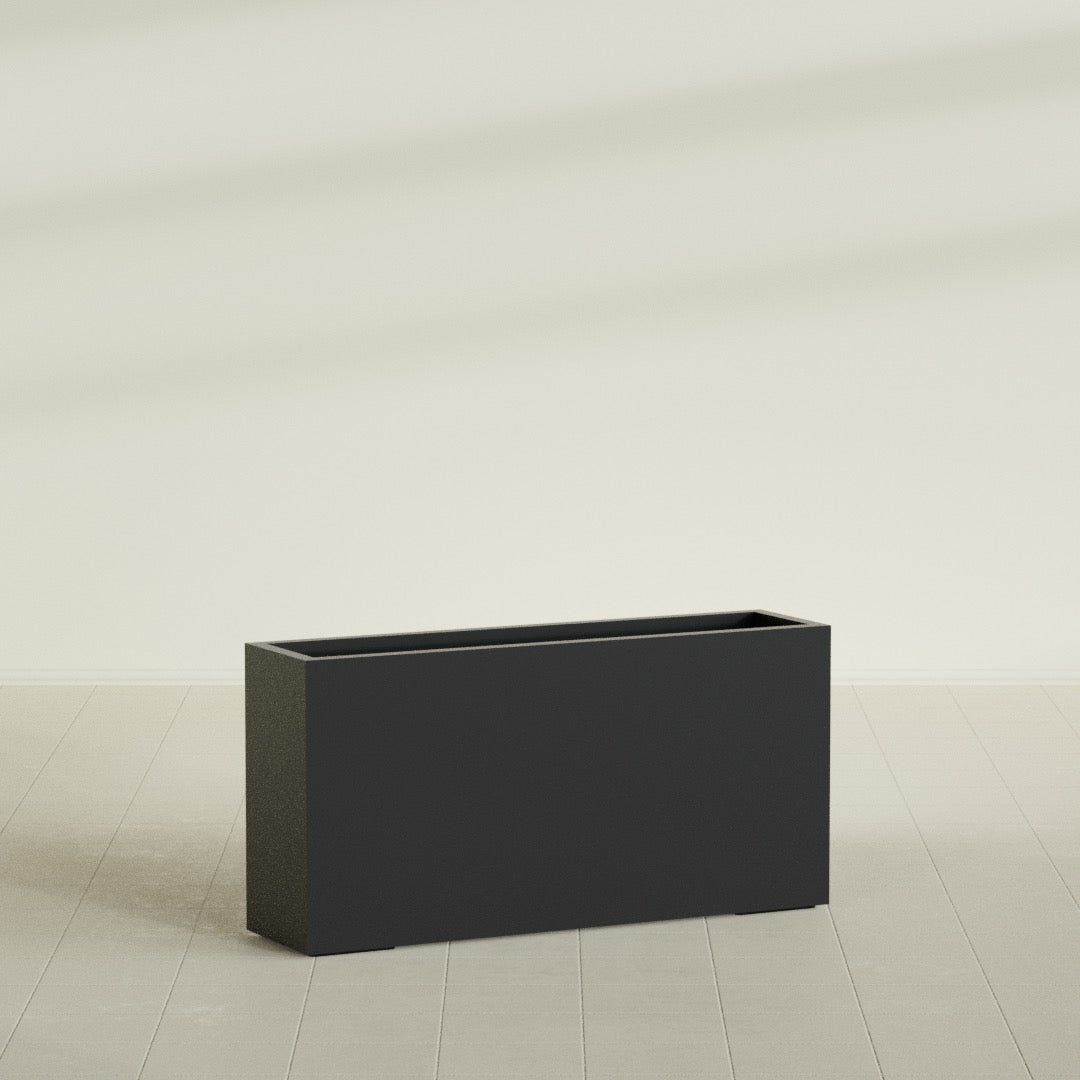 Hollywood Narrow Rectangular Planter in Matte Black, 48"L × 12"D × 24"H, shown empty